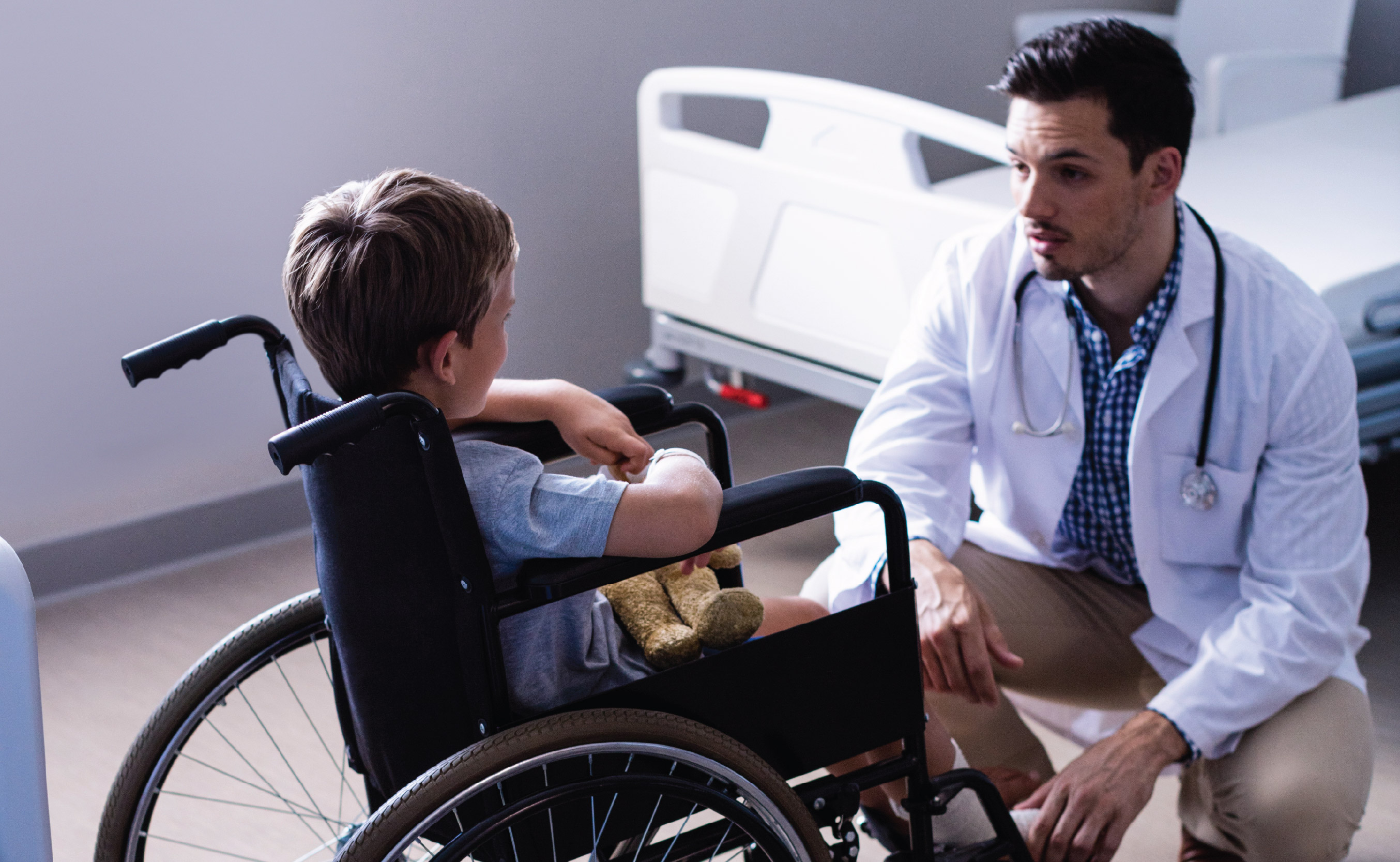 Parents teaching kid to ride bike